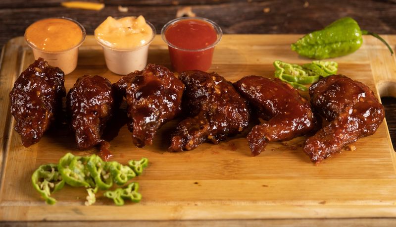 Sauced Tenders tossed in wing sauce